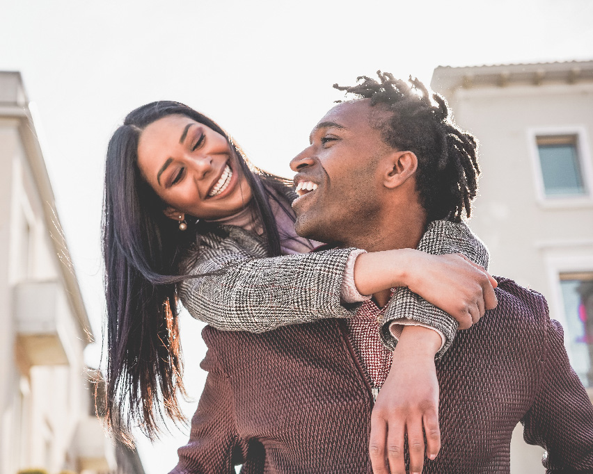 Black Couple happy outside