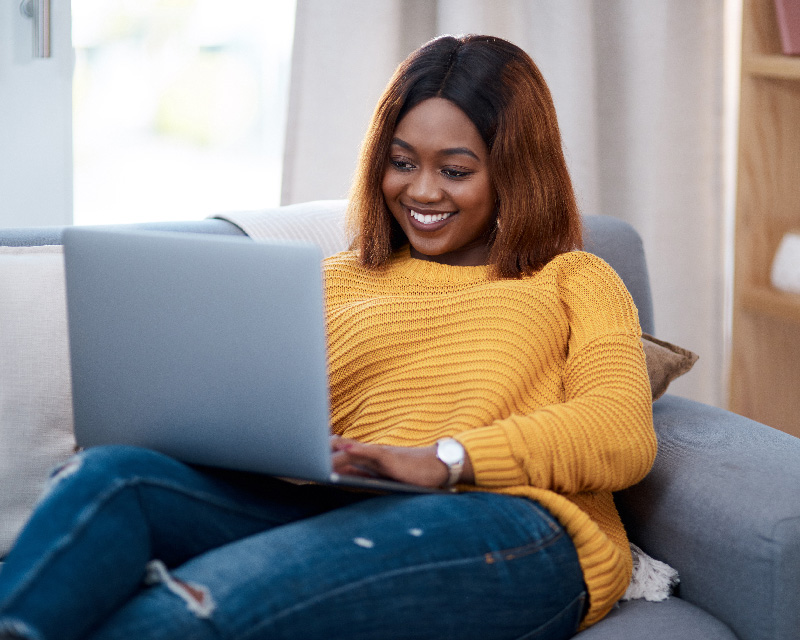 Young black woman having online therapy