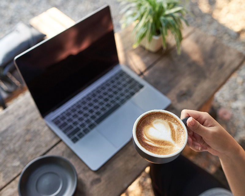 Laptop and latte for therapy with Taronda Jones