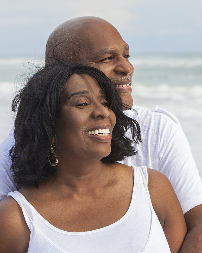 Senior couple on the beach; online therapy for Seniors